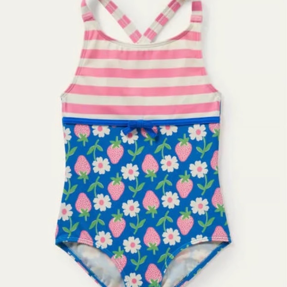 Mini Boden swim fun with this vibrant one-piece swimsuit from Mini Boden One Pi